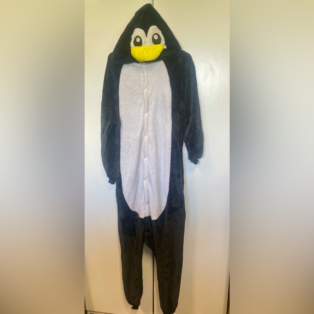 Penguin onesie costume.  Fits men’s large or women’s XL.  Halloween or theater